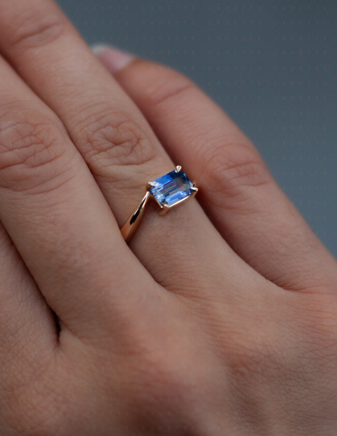 One-of-a-kind — 1.25ct Blue Emerald Cut Sapphire HORIZONTAL Rapture Ring