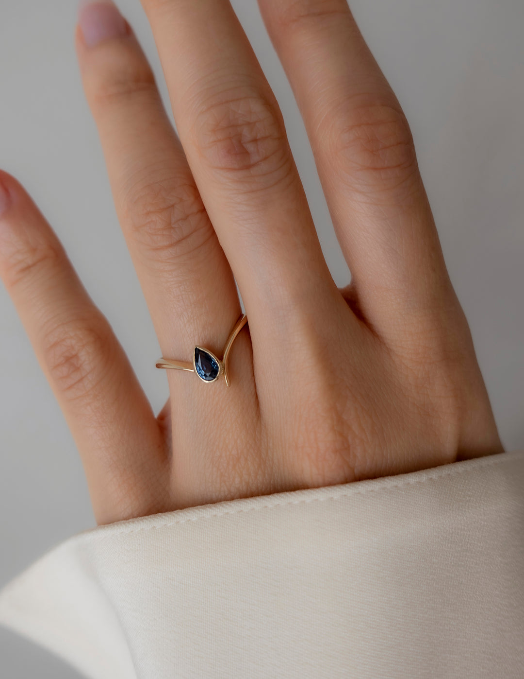 One-of-a-kind — Deep Blue Sapphire Pear Eve Ring