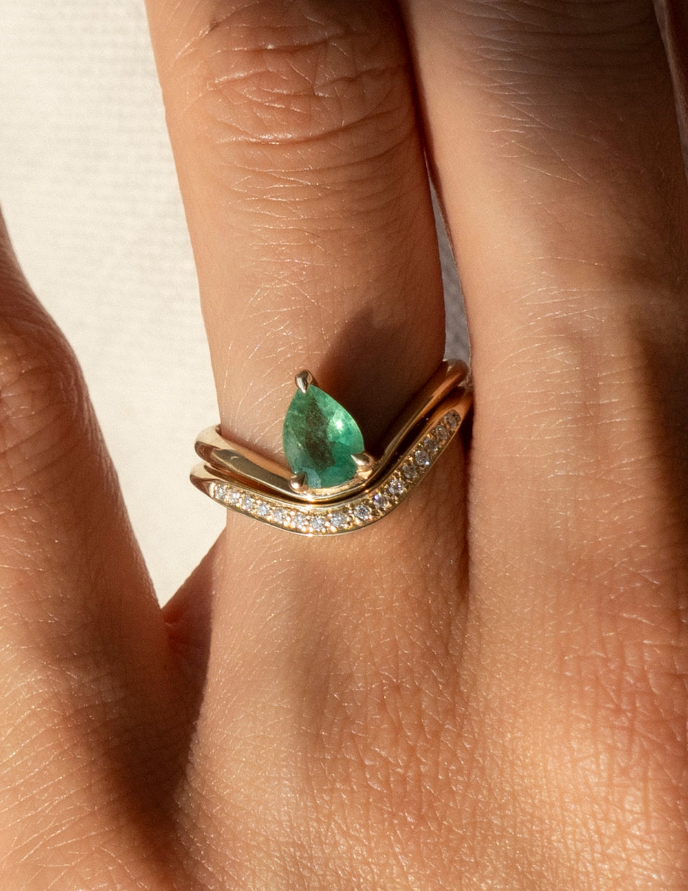 Cadette Pear emerald Sunrise engagement ring. Pear emerald nature inspired engagement ring. Pear emerald sunrise inspired engagement ring.