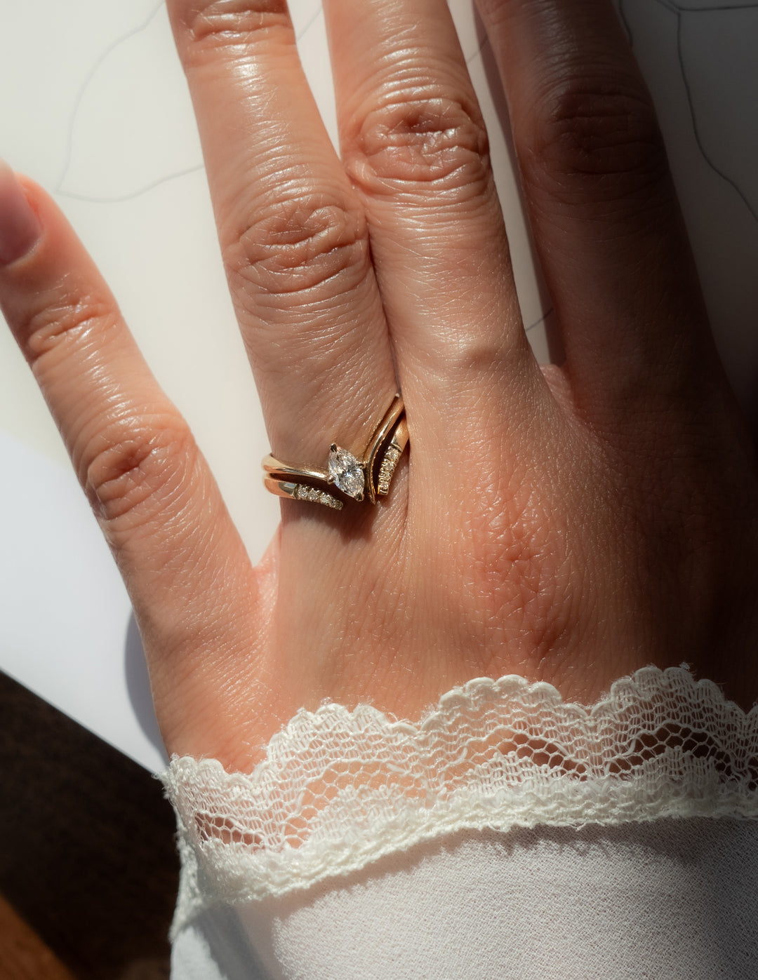 Cadette Marquise Eve engagement ring with claw setting. Marquise nature-inspired engagement ring. Marquise plant-inspired engagement ring.