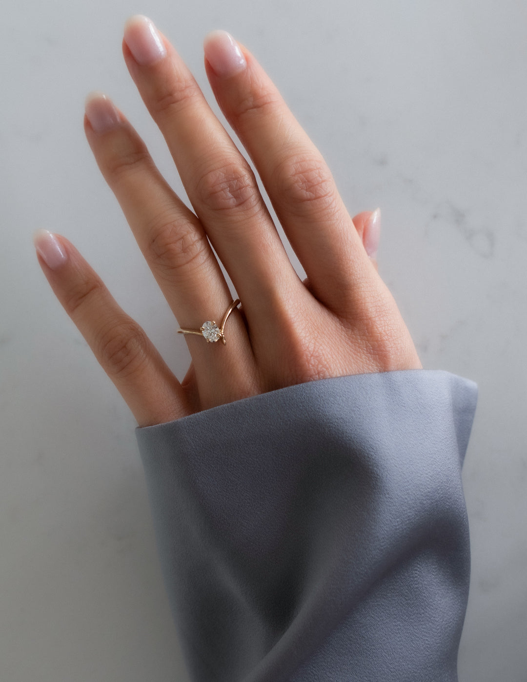 Oval Eve Ring — Claw Setting