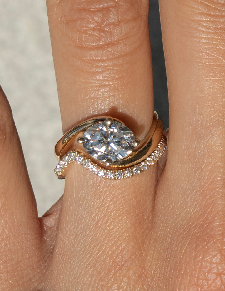 Cadette Oval Rapture engagement ring with Minimal Pave Band.