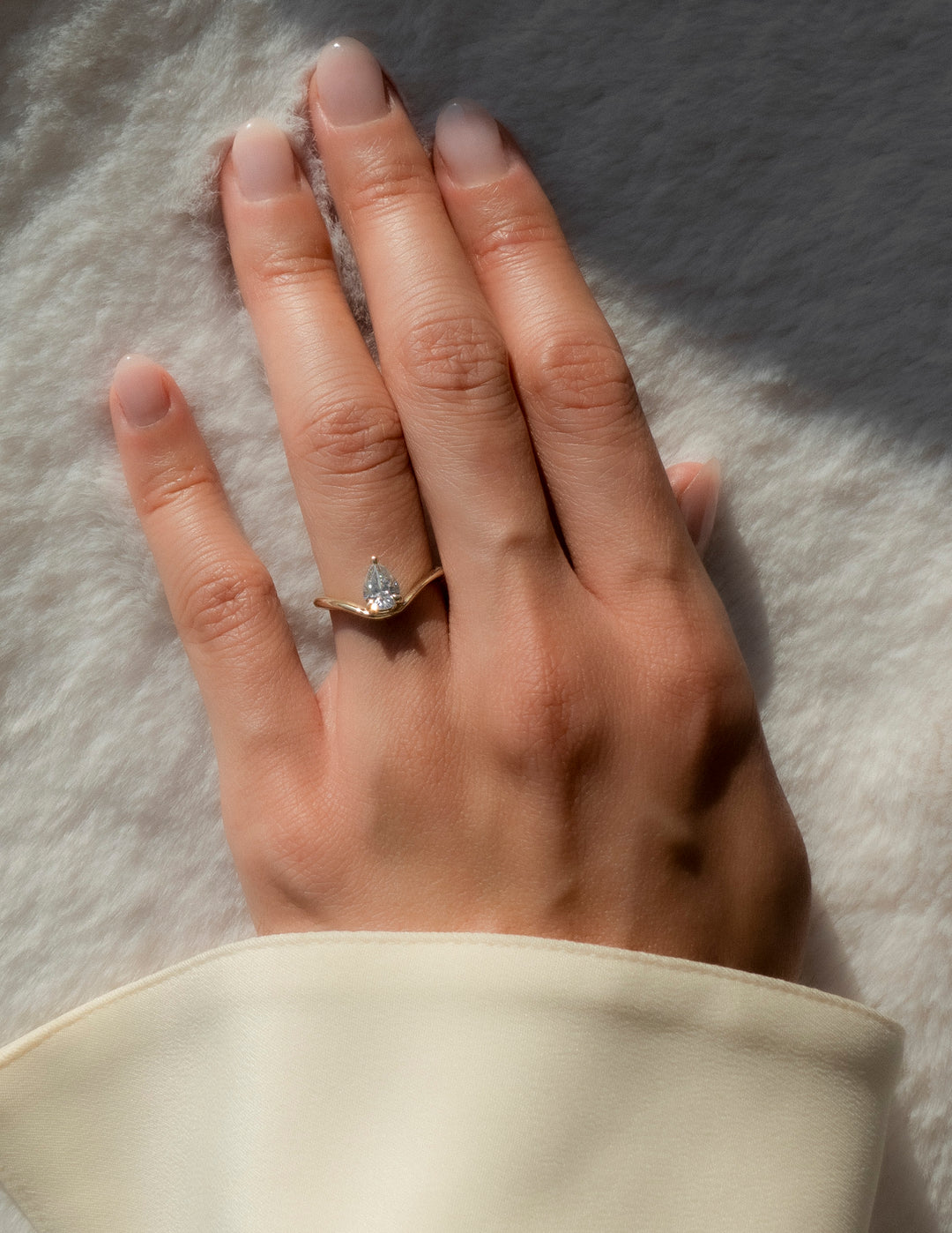 Cadette Pear Sunrise engagement ring. Pear nature inspired engagement ring. Pear sunrise inspired engagement ring.