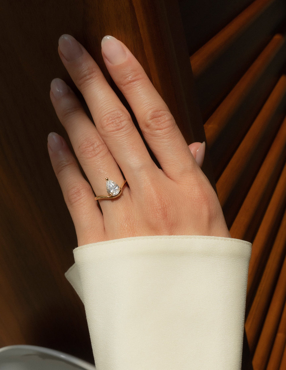 Cadette Pear Sunrise engagement ring. Pear nature inspired engagement ring. Pear sunrise inspired engagement ring.