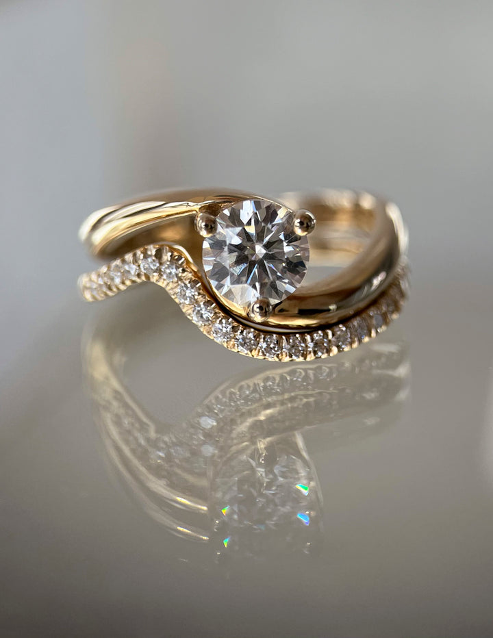 Cadette Round Rapture engagement ring set with minimal pave band.