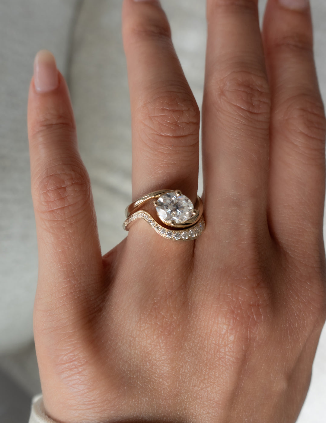 Cadette Oval Rapture engagement ring set with band. Oval Ocean Inspired Engagement solitaire Ring with band. Oval Nature Inspired Engagement solitaire Ring with band.