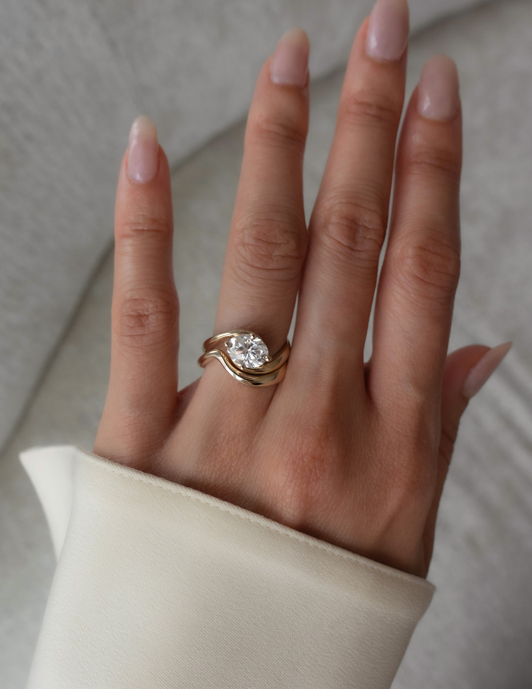 Cadette Oval Rapture engagement ring set with band. Oval Ocean Inspired Engagement solitaire Ring with band. Oval Nature Inspired Engagement solitaire Ring with band.