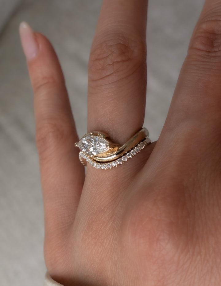 Cadette Marquise Rapture engagement ring set with band. Marquise Ocean Inspired Engagement solitaire Ring with band. Marquise Nature Inspired Engagement solitaire Ring with band.