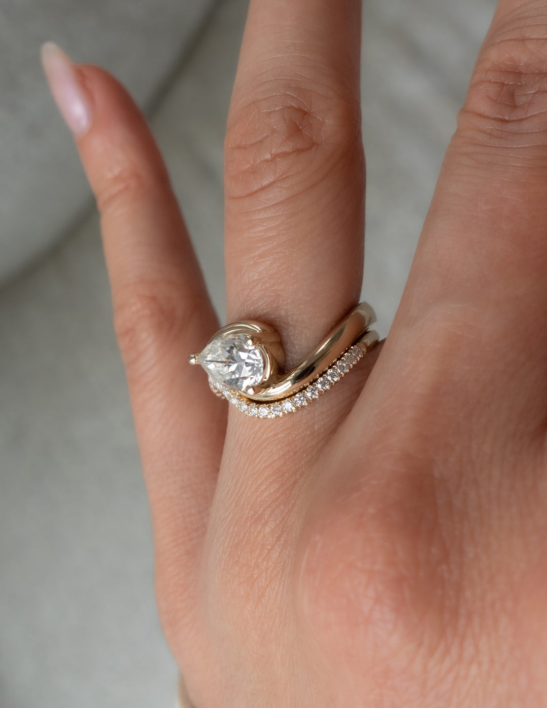 Cadette Pear Rapture engagement ring set with band. Pear Ocean Inspired Engagement solitaire Ring with band. Pear Nature Inspired Engagement solitaire Ring with band.