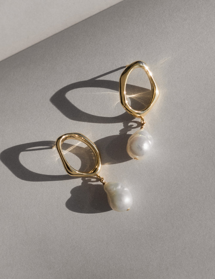 modern and organic gold baroque pearl earrings